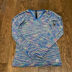 Cute RBX sports shirt, it includes thumb holes and is a women’s small.